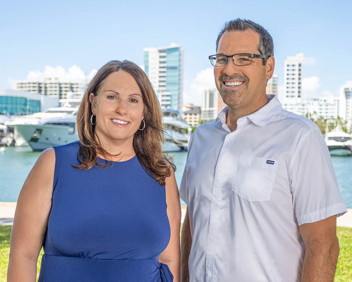 Michele and Mark Gissibl, founders of MAG HR Solutions, on the Sarasota waterfront